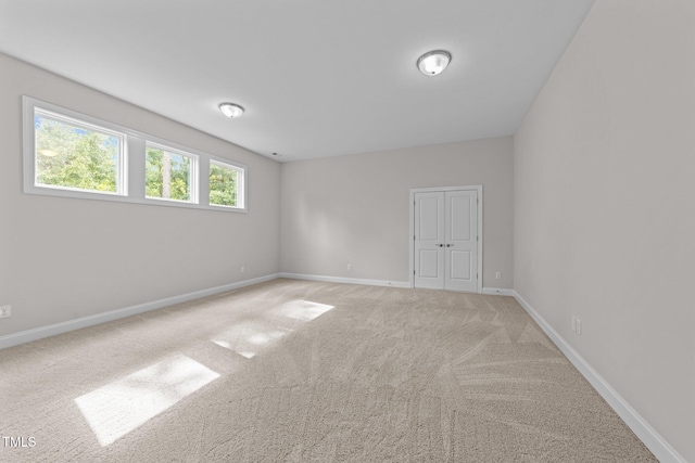 7502 Latteri Ct, Raleigh, NC 27613 - unfurnished room featuring light colored carpet and baseboards