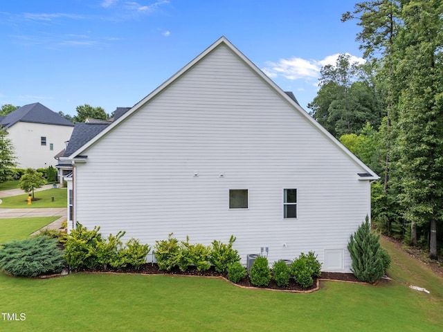 7502 Latteri Ct, Raleigh, NC 27613 - view of property exterior featuring a lawn