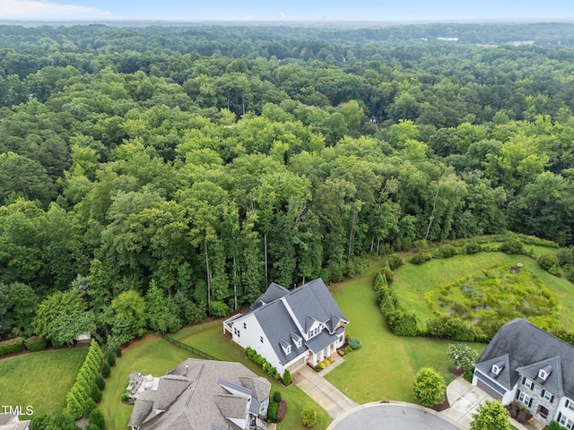 7502 Latteri Ct, Raleigh, NC 27613 - drone / aerial view of a heavily wooded area