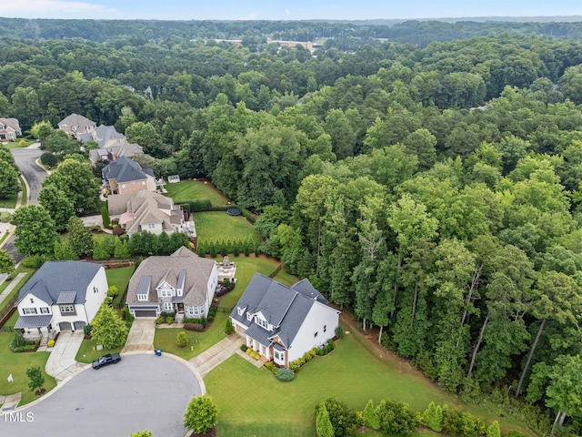 7502 Latteri Ct, Raleigh, NC 27613 - aerial perspective of suburban area with a forest