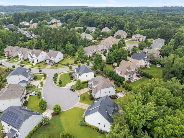7502 Latteri Ct, Raleigh, NC 27613 - aerial perspective of suburban area with a forest