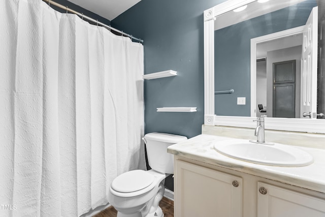 50 Rainwood Ct, Louisburg, NC 27549 - bathroom featuring toilet, vanity, wood finished floors, and a shower with shower curtain