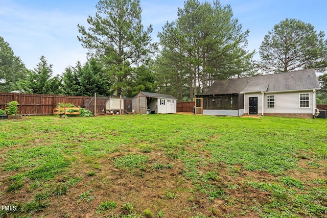 50 Rainwood Ct, Louisburg, NC 27549 - view of yard with a sunroom and central AC
