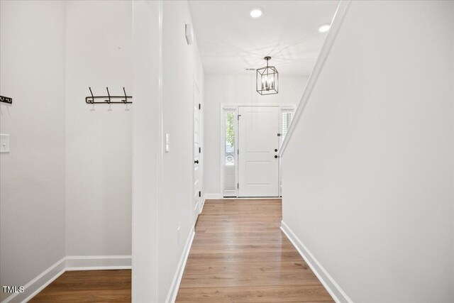 214 George Pine Way, Knightdale, NC 27545 - entryway featuring recessed lighting, light wood-type flooring, baseboards, and a chandelier