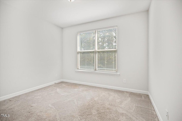 214 George Pine Way, Knightdale, NC 27545 - spare room with baseboards and carpet floors