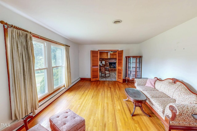 9455 Boston Rd, Roxboro, NC 27574 - living room with light wood finished floors and baseboards
