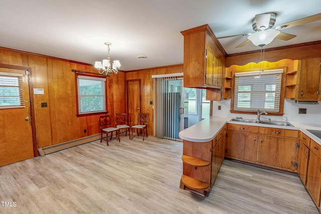 9455 Boston Rd, Roxboro, NC 27574 - kitchen with open shelves, a sink, a baseboard radiator, light countertops, and wooden walls