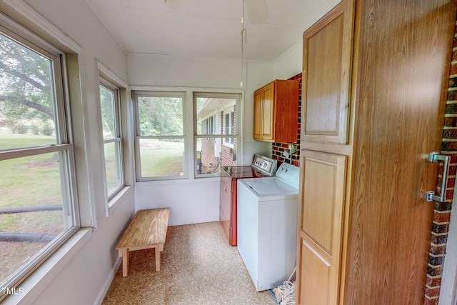 9455 Boston Rd, Roxboro, NC 27574 - laundry area with cabinet space, independent washer and dryer, plenty of natural light, and baseboards