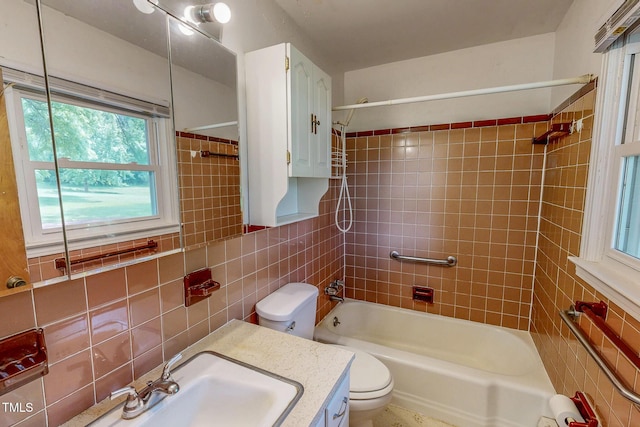 9455 Boston Rd, Roxboro, NC 27574 - bathroom featuring tile walls, bathtub / shower combination, toilet, and vanity