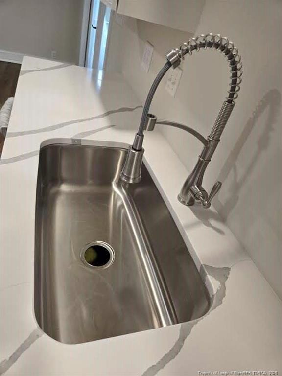 409 Thimbleberry Dr, Vass, NC 28394 - kitchen view of a sink and light countertops