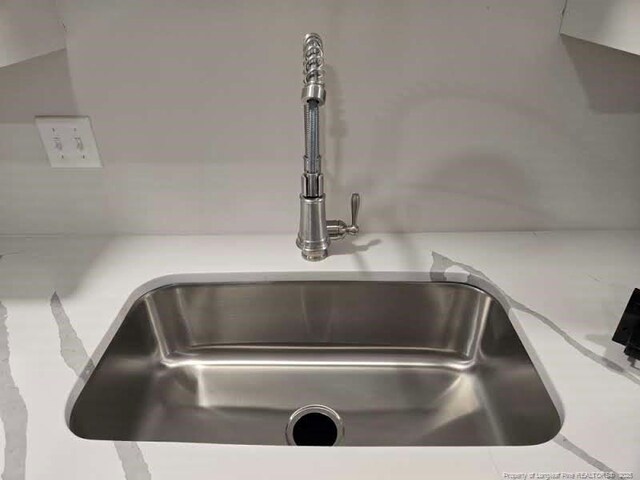 409 Thimbleberry Dr, Vass, NC 28394 - kitchen view of a sink and light countertops