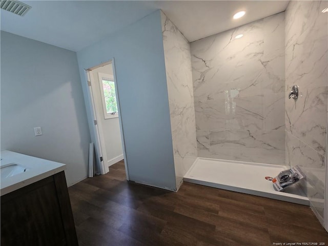 409 Thimbleberry Dr, Vass, NC 28394 - full bath featuring a marble finish shower, vanity, and wood finished floors