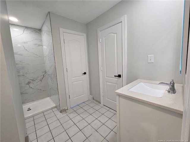 409 Thimbleberry Dr, Vass, NC 28394 - full bath with a marble finish shower, vanity, and tile patterned flooring