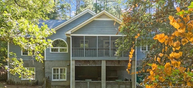 409 Thimbleberry Dr, Vass, NC 28394 - rear view of property featuring a sunroom
