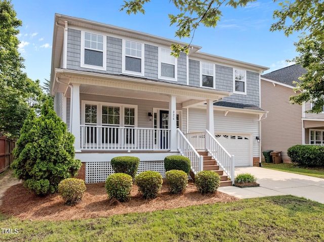 324 Farrow Glen Loop, Cary, NC 27519 - view of front facade featuring a porch, driveway, and an attached garage
