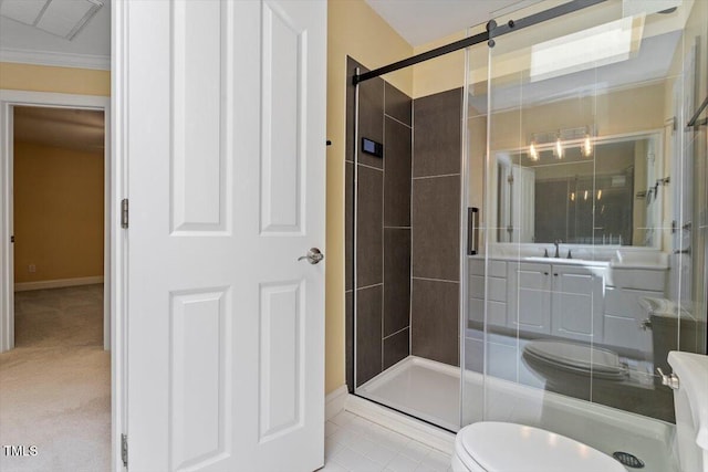 1211 E Pointe Dr, Durham, NC 27712 - bathroom featuring toilet, a stall shower, baseboards, a sink, and crown molding