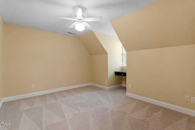 1211 E Pointe Dr, Durham, NC 27712 - bonus room featuring light colored carpet, vaulted ceiling, baseboards, and ceiling fan