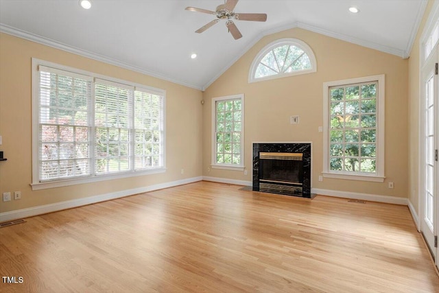 1211 E Pointe Dr, Durham, NC 27712 - unfurnished living room with light wood-style floors, a fireplace, ceiling fan, vaulted ceiling, and baseboards
