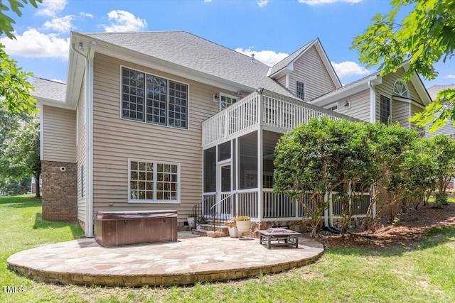 1211 E Pointe Dr, Durham, NC 27712 - rear view of house featuring a hot tub, a patio area, a balcony, a lawn, and a sunroom