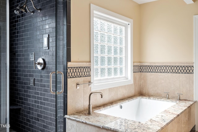 1211 E Pointe Dr, Durham, NC 27712 - bathroom with healthy amount of natural light, a bath, and a shower stall