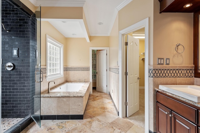 1211 E Pointe Dr, Durham, NC 27712 - full bathroom featuring a shower stall, a garden tub, crown molding, vanity, and a wainscoted wall