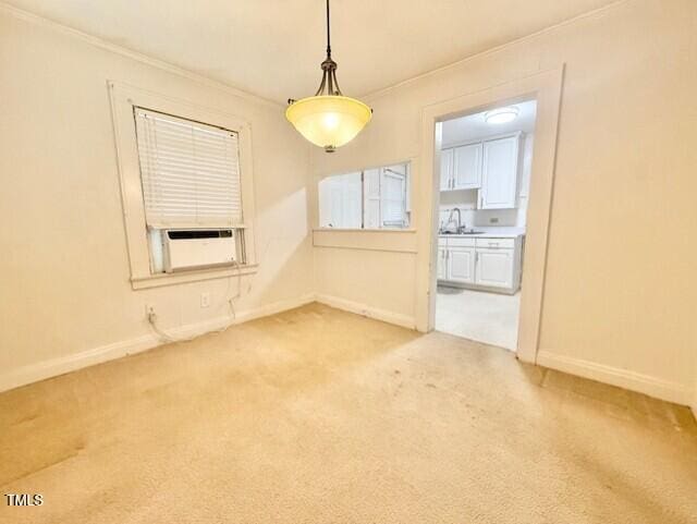 1112 N Driver St, Durham, NC 27701 - unfurnished dining area with light carpet, baseboards, ornamental molding, and cooling unit
