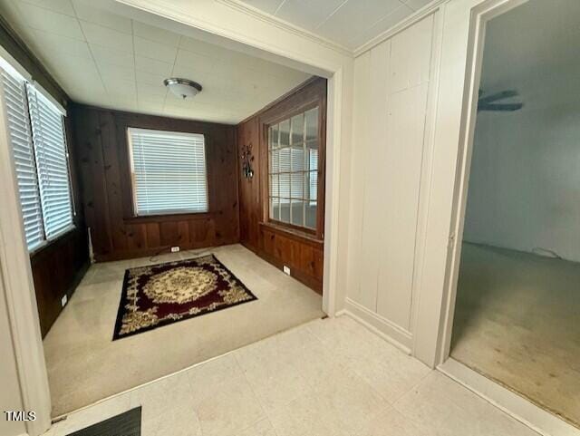 1112 N Driver St, Durham, NC 27701 - hall featuring a decorative wall, carpet floors, ornamental molding, and wood walls