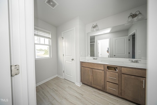 1108 Matterhorn Dr, Fuquay Varina, NC 27526 - full bath featuring double vanity and baseboards