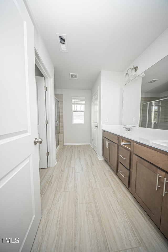 1108 Matterhorn Dr, Fuquay Varina, NC 27526 - full bathroom with double vanity and a shower stall
