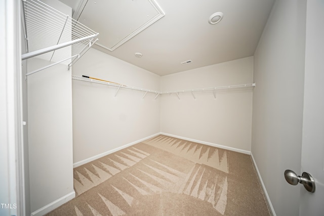 1108 Matterhorn Dr, Fuquay Varina, NC 27526 - spacious closet featuring attic access and carpet flooring