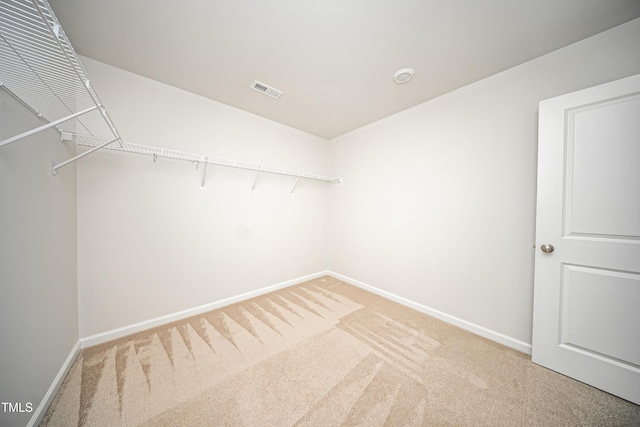 1108 Matterhorn Dr, Fuquay Varina, NC 27526 - spacious closet featuring light carpet