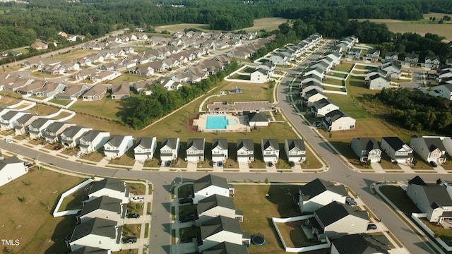 1108 Matterhorn Dr, Fuquay Varina, NC 27526 - aerial overview of property's location featuring nearby suburban area and a heavily wooded area