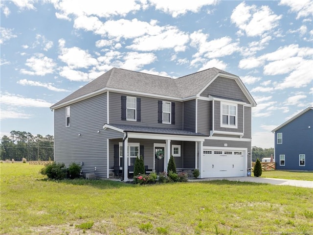 298 Turkey Trot Ln, Raeford, NC 28376 - view of front facade with driveway, a porch, an attached garage, and a front lawn