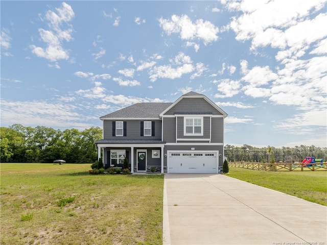 298 Turkey Trot Ln, Raeford, NC 28376 - view of front of home with an attached garage, driveway, a front lawn, and a porch