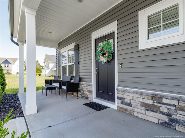 298 Turkey Trot Ln, Raeford, NC 28376 - entrance to property with covered porch and stone siding
