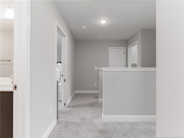298 Turkey Trot Ln, Raeford, NC 28376 - hall with carpet, baseboards, and a sink