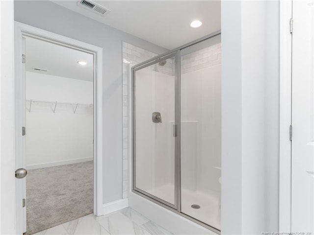 298 Turkey Trot Ln, Raeford, NC 28376 - bathroom featuring a shower stall, recessed lighting, a spacious closet, baseboards, and marble look tile flooring