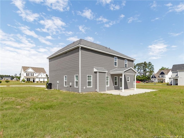 298 Turkey Trot Ln, Raeford, NC 28376 - rear view of property with a patio and a lawn