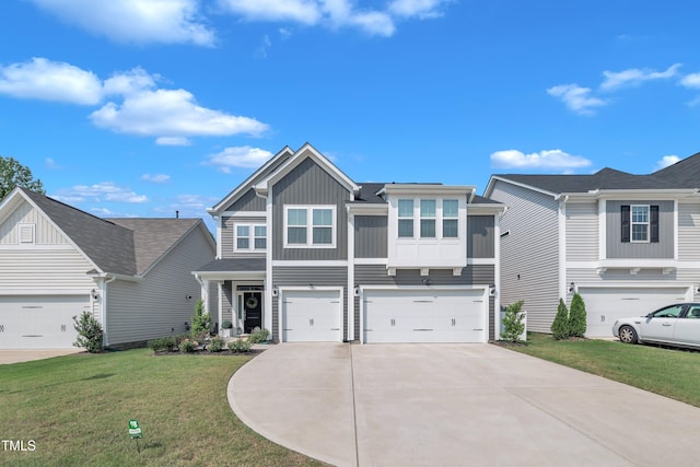325 Buckhorn Branch Park, Clayton, NC 27520 - view of front of house with board and batten siding, driveway, a garage, and a front lawn