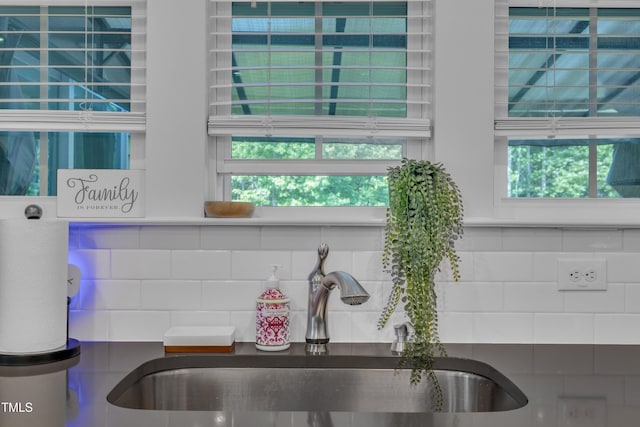 325 Buckhorn Branch Park, Clayton, NC 27520 - kitchen view of a sink, tasteful backsplash, and dark countertops