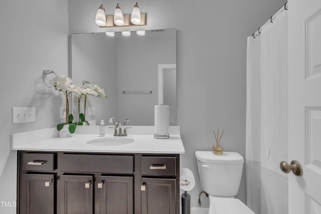 325 Buckhorn Branch Park, Clayton, NC 27520 - bathroom with toilet, vanity, and curtained shower
