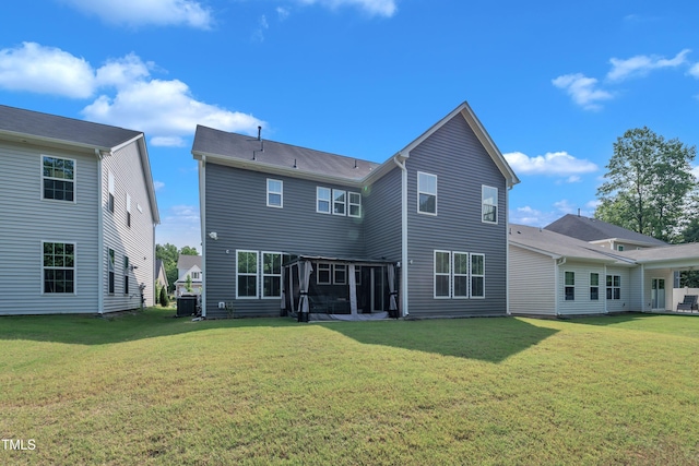 325 Buckhorn Branch Park, Clayton, NC 27520 - rear view of house with a sunroom, a yard, and cooling unit