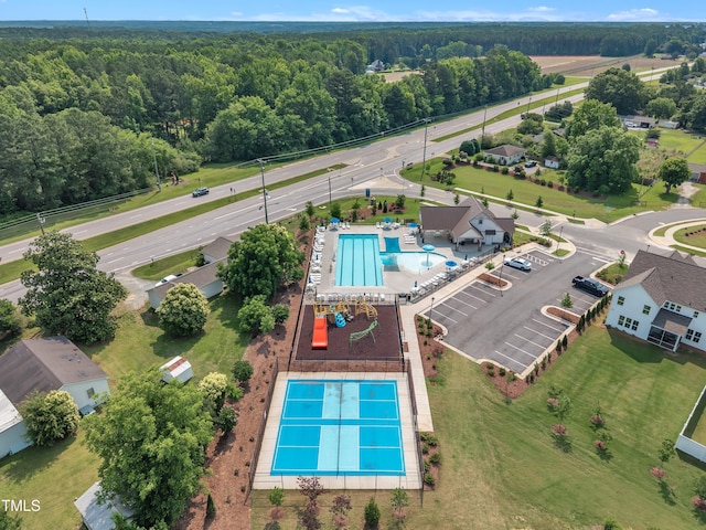 325 Buckhorn Branch Park, Clayton, NC 27520 - drone / aerial view of a pool area and a forest