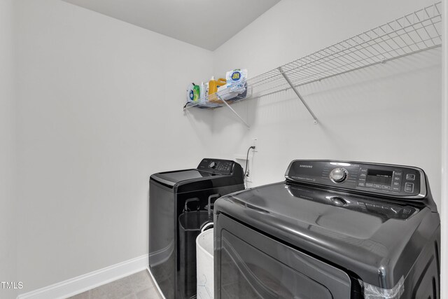 520 Oak Holly Ln, Zebulon, NC 27597 - washroom with independent washer and dryer and baseboards