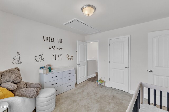 520 Oak Holly Ln, Zebulon, NC 27597 - bedroom with attic access and light colored carpet