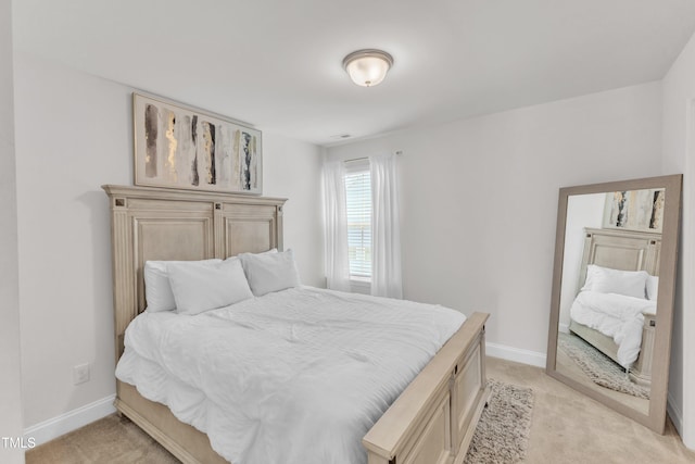 520 Oak Holly Ln, Zebulon, NC 27597 - bedroom with light colored carpet and baseboards