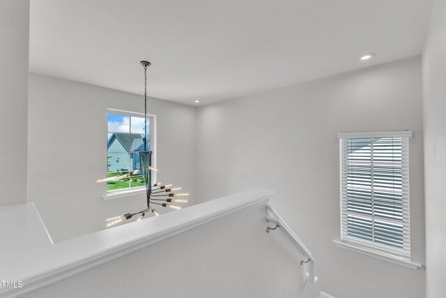 520 Oak Holly Ln, Zebulon, NC 27597 - hallway featuring an upstairs landing, baseboards, and recessed lighting