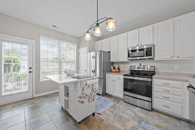 5717 Corbon Crest Ln, Raleigh, NC 27612 - kitchen featuring stainless steel appliances, white cabinetry, light countertops, and open shelves