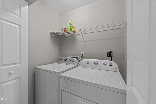 5717 Corbon Crest Ln, Raleigh, NC 27612 - laundry area featuring separate washer and dryer