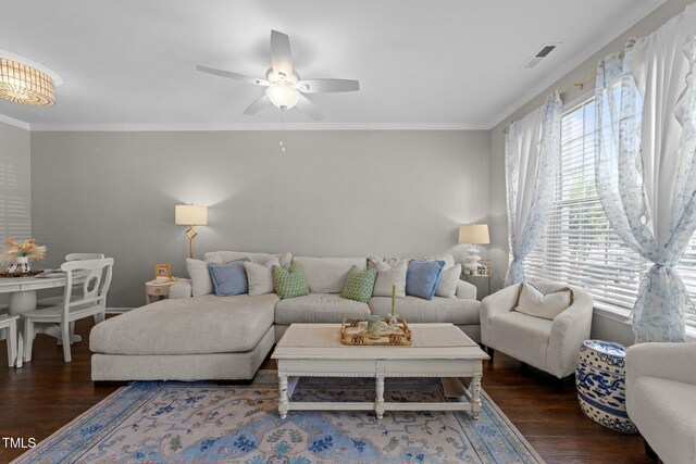 5717 Corbon Crest Ln, Raleigh, NC 27612 - living area with wood finished floors, ceiling fan, and crown molding